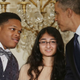 Obama congratulates Anthony Halmon (left) and other students at White House Science Fair. (Chip Somodevilla/Getty Images)